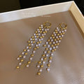 Gold Multi Strand Pearl Tassel Huggie Statement Earrings view 4
