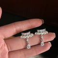 Silver Tone Pearl Look Ear Clips with Crystal Teardrop Dangles view 1