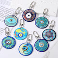 Silver Tone Round Printed Evil Eye Clip Keychains in Eight Designs view 1