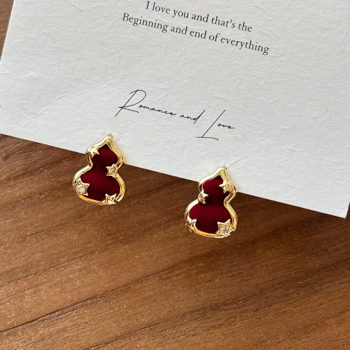 Burgundy Gourd Shape Stud Earrings With Gold Tone Trim