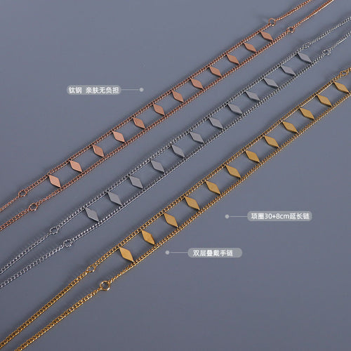 Three rhombus sequin chokers rose steel gold with length material labels