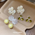 Silver Tone Floral Stud Earrings in Three Designs With Decorative Details view 1