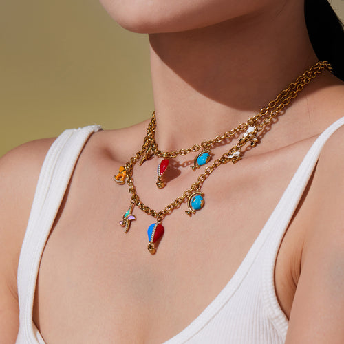Display view of travel charm necklace and bracelet in main image 2.