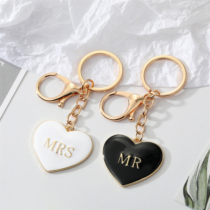 Gold Tone Black and White MR and MRS Heart Keychains