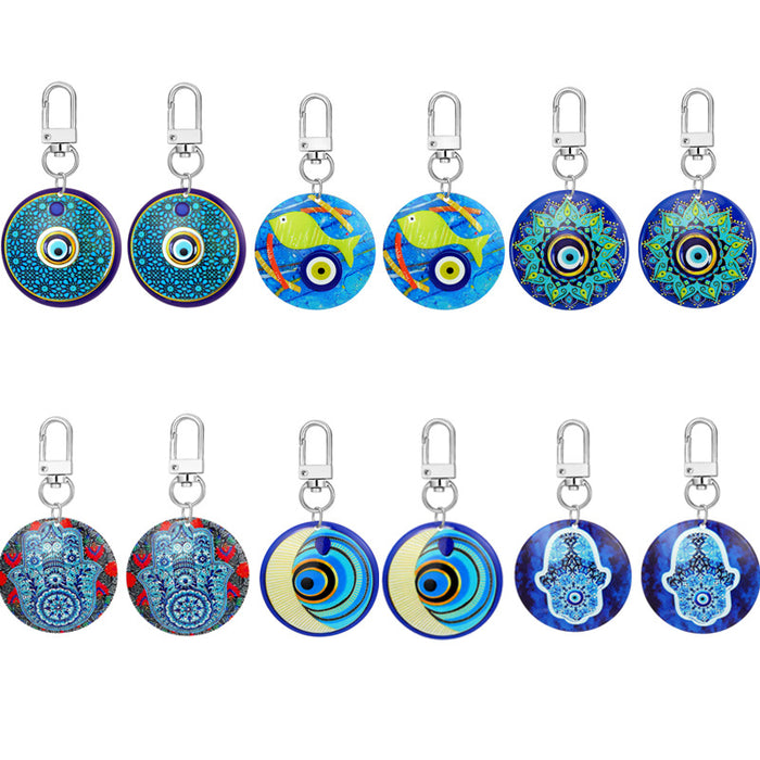 Twelve Piece Printed Round Evil Eye and Hamsa Clip Keychain Set