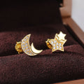 Gold Tone Asymmetric Crescent Moon And Star Stud Earrings view 2