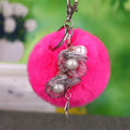 Pearl Wire Flower Pom Pom Keychains in Fifteen Pictured Colors view 4