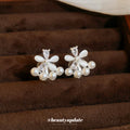 Floral Pearl Clip-On Earrings in Silver and Gold with Polished Metal Details view 3