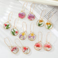 Gold Tone Round Clear Resin Pressed Flower Long Wire Earrings view 1