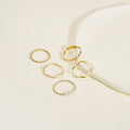 Gold Five Piece Thin Stacking Ring Set Pearl Wave Twists view 3