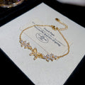 Crystal Butterfly Flower Chain Bracelets Gold and Silver view 6