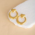 Thirty-Five Gold Tone Floral and Sculptural Stud Earrings view 11