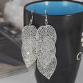 Forty-Two Gold Silver and Black Geometric Dangle Earrings view 10