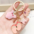 Pink and Blue Baby Elephant Bottle and Footprint Charm Keychain Pair view 2