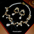 Gold Pearl Teardrop Necklace And Crystal Heart Drop Earrings view 1