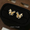 Gold Dual Layer Butterfly Stud Earrings White Outline Wings view 4