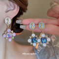 Floral Crystal Drop Earrings in Purple and Blue Colorways view 2