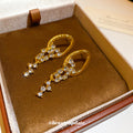 Gold Tone Crystal Oval Tassel Drop Earrings With Star Accents view 2