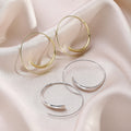 Slim Open Elongated Oval Wire Gold and Silver Hoop Earrings view 1