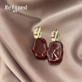 Wine Red Glossy Enamel Drop Earrings Gold Tone Textured Posts view 2
