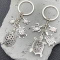Two Silver Tone Turtle Family Keychain Designs with Metal Hardware view 2