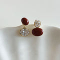 Gold Tone Red and Clear Crystal Asymmetric Stud Earrings view 3