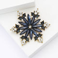 Crystal Snowflake Brooch With Polished Metal And Sculpted Decorative Details view 3