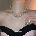 Gold Pearl Cross Link Necklace Matching Drop Earrings view 4