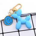 Gold Tone Balloon Dog and Smile Disc Clip Keychains view 6
