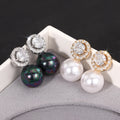 Pearl-Like Drop Stud Earrings With Round Clear Stone Halos view 4