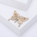 Enamel Butterfly Brooch With Polished Metal And Sculpted Decorative Details view 3