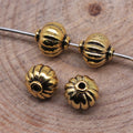 Pumpkin Round Spacer Bead in Antique Gold and Antique Bronze and Antique Silver Metal view 2