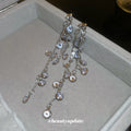 Silver Tone Crystal Strand Drop Earrings with Teardrop Ends view 3