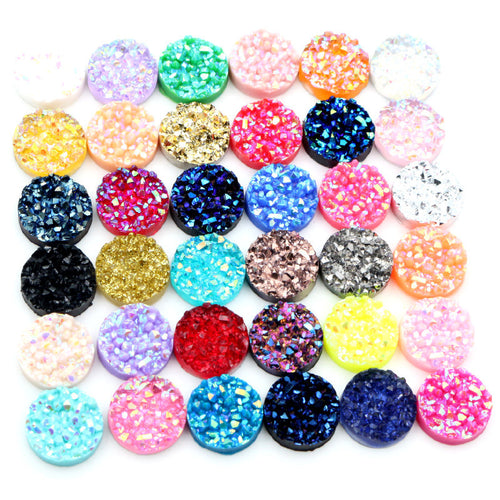 Finish comparison of round druzy cabochons with sparkling textured tops