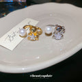 Gold Open Bear Ring With Pearl and Star Crystal Ends view 2