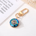 Gold and Silver Tone Blue Crystal Evil Eye Clip Keychains view 6