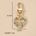 Gold Tone Rhinestone Heart Lash Eye Clip Keychains in Five Colors view 4
