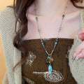 Blue Beaded Pendant Necklace and Matching Drop Earrings view 1