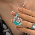 Silver Tone Blue Green Curling Wave And Clear Stone Necklace view 1