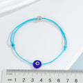 Round Blue Evil Eye Cord Bracelets in Six Bright Colors view 2