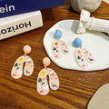 U Shape Christmas Print Acrylic Drop Earrings Pink Blue view 1
