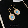 Blue Round Stone Drop Earrings with White Halo and Gold Tone Hooks view 2