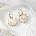 Gold Tone Moon and Butterfly Pressed Flower Huggie Earrings in Eight Designs view 6