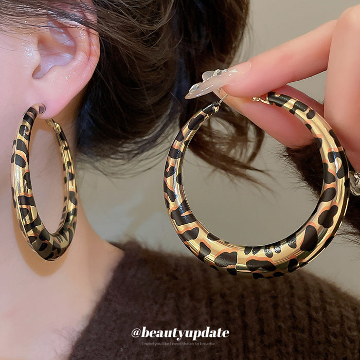 Black and White Wrapped Hoop Earrings with Gold Tone Edges