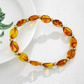 Oval Glass Bead Stretch Bracelet with Gold-Tone Spacers view 8