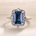 Deep Blue Rectangular Solitaire Floral Halo Ring Silver Tone view 1