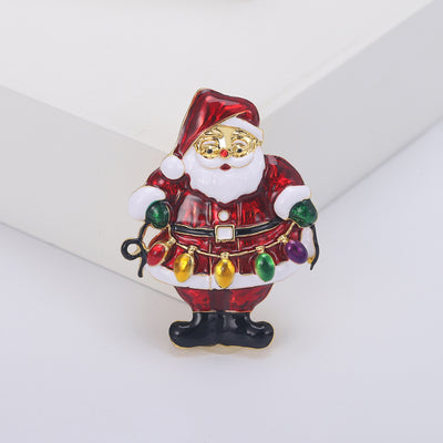 Enamel Santa Claus brooch front view on a white background