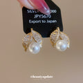 Gold Tone Leaf and Pearl Drop Stud Earrings With Polished Metal Details view 2