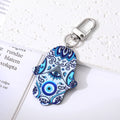 Silver Tone Printed Hamsa Acrylic Clip Keychains in Five Designs view 2