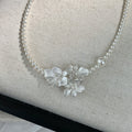 White Pearl Strand Necklace with Floral Center Accent view 4